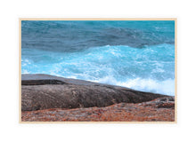 Load image into Gallery viewer, Ocean Photography Wall Art Print of the hypnotic blues of the ocean contrasting with wave drenched rocks, taken at Madfish Bay, Denmark, Western Australia. Canvas Print with Wood Frame.
