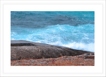 Load image into Gallery viewer, Ocean Photography Wall Art Print of the hypnotic blues of the ocean contrasting with wave drenched rocks, taken at Madfish Bay, Denmark, Western Australia. Fine Art Print with White Frame.
