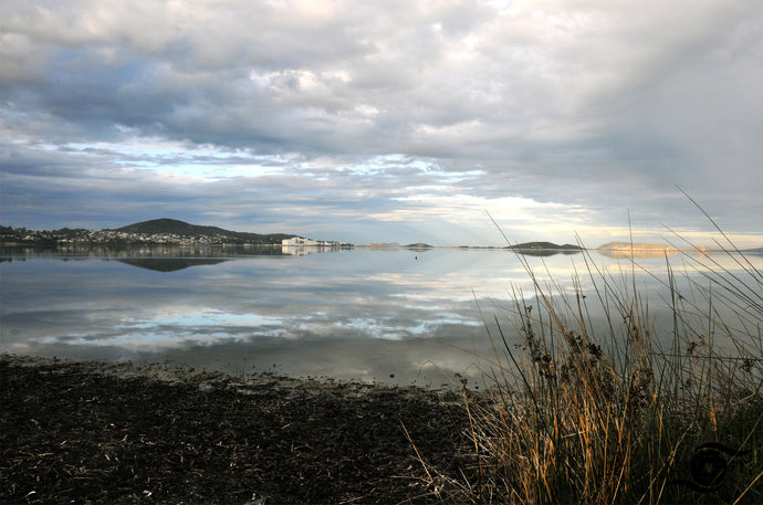 Ocean Photography Wall Art Print taken across a perfectly flat and still 