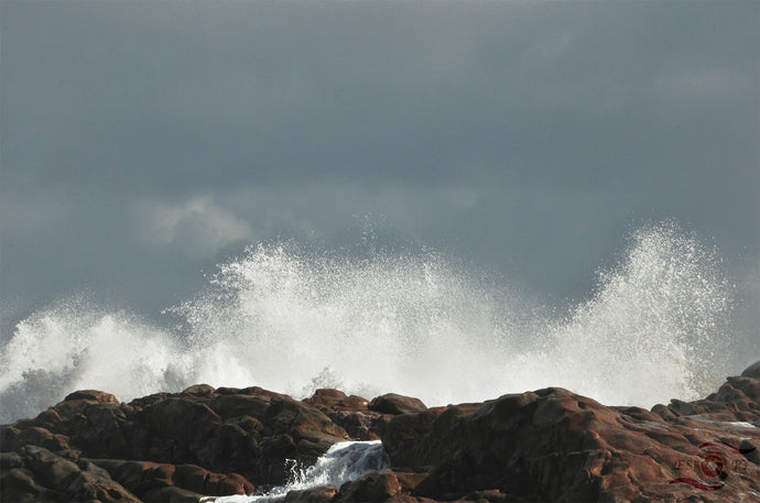 Ocean Photography Wall Art Print of the white spray of splashing waves contrasting dark rocks and grey sky, in the ferocious Southern Ocean off Denmark in South Western Australia. Unframed Print. 